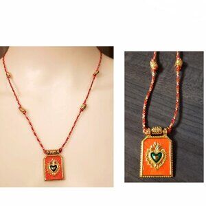 NWT Orange medallion on Cord necklace